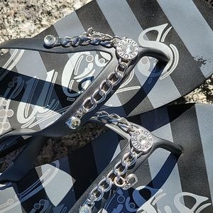 Womens Guess Black & Silver Flip Flops with Rhinestone and Charm Embellishments